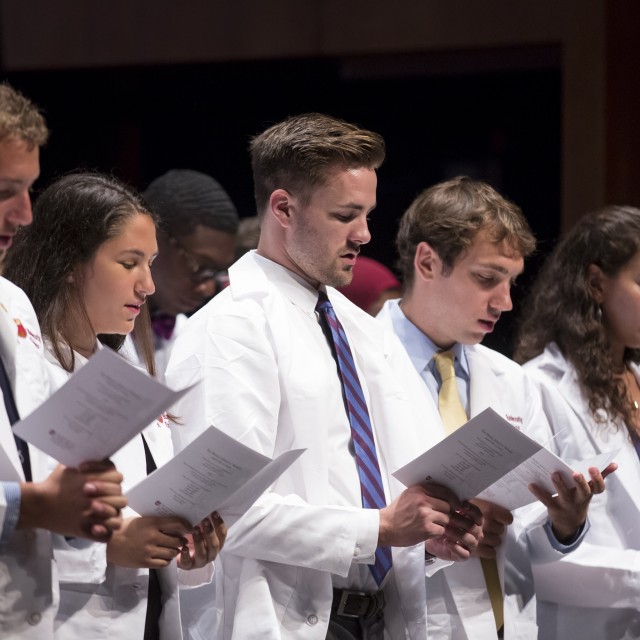 Photo of Pritzker students at white coat ceremony