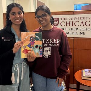 Pritzker Students Prachi Shah and Sharanya Thodupunoori with their new book &quot;Priya, Healthy Hero!&quot;